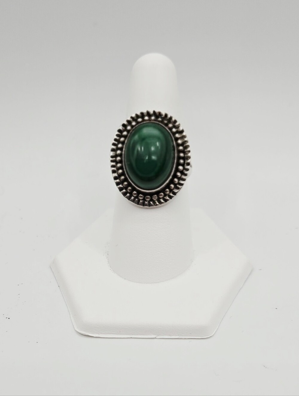 Oval Hemitate Cabochon Cut Stone Set In Silver-Accent Ring
